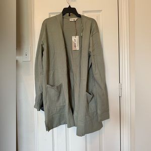 New In size small cardigan